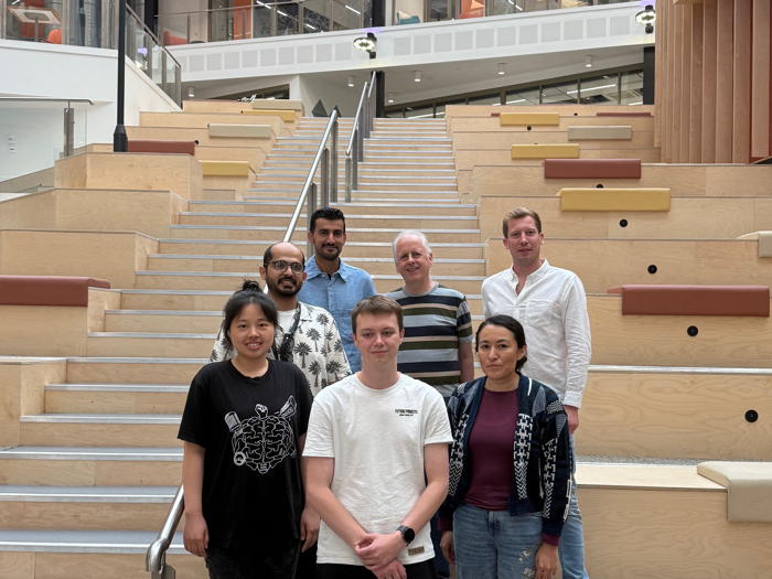 Group photograph taken in July 2025.